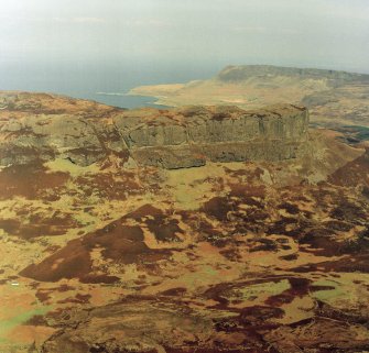 Oblique aerial view centred on the remains of the An Sgurr fort, taken from the S.