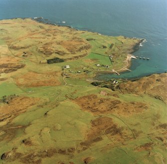 Oblique aerial view centred on Port Mor and the remains of the township with the chapel adjacent, taken from the W.