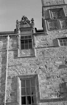 Detail of carved pediment, N elevation of courtyard, Cullen House.