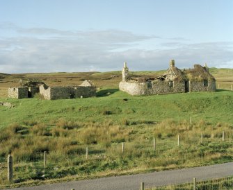 Thatched house and outbuildings, view from N