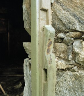 Thatched house, detail of wooden door latch and lock