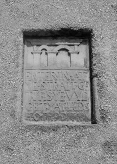 View of inscribed panel set in wall of St Adrian's Church, Anstruther Wester.