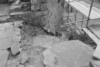 Kinloss Abbey
Excavation, July 1995
Film 1
Frame 19 - Steps leading down from north apartment and area to north of them - from north
