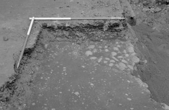 Bishop's Close, Brechin
Excavation Archive
Frame 11 - Surface of road no. 3 with road no. 4 - from west

