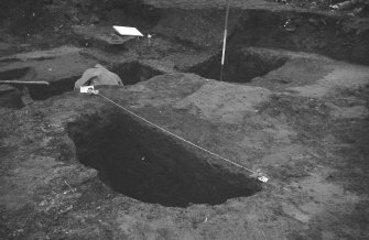 Excavation photograph : fill 13, pit 16, looking north-west.