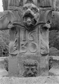 Detail of date plaque on fountain in garden of Ravelston House, Edinburgh.