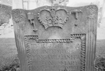 Detail of the gravestone of William Paterson and Mary Leitch, 1749, in the churchyard of New Kilpatrick Parish Church.