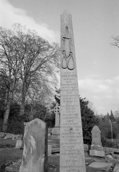 View of obelisk commemorating James Stirling, 1855, in the churchyard of New Kilkpatrick Parish Church.
