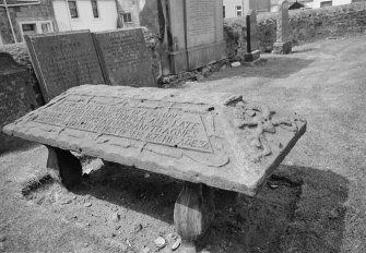 View of table stone for David Binning dated 1675, in the churchyard of Pittenweem Parish Church.