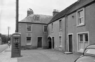 General view of buildings on the High Street, Ayton, from N.