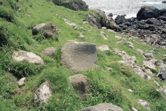 Muck, Caisteal an Duin Bhain. Saddle Quern (NM 4215 7866).