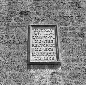 Detail of  plaque inscribed "ERECTED AD1409 ADDED TO AD 1793 RESTORED AD 1865 ENLARGED AD 1909"