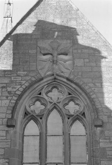 Detail.  Window and carved panel on E gable.