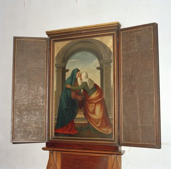 Interior.  Detail of painted panel with the interior of the doors covered with embossed leather.