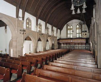 Interior.  View of aisle and pews.