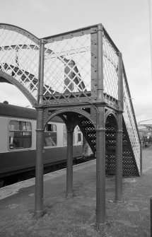 View of Dingwall Station footbridge, bearing maker's name, 'Hanna, Donald & Wilson, Paisley'