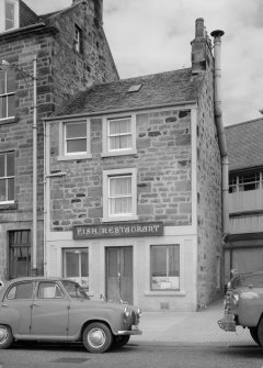 View of 17 Shore Street, Anstruther Easter, from S, showing a fish restaurant.
