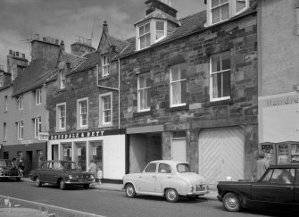 View of 37-39 Shore Street, Anstruther Easter, from S, showing the premises of Drysdale & Bett.