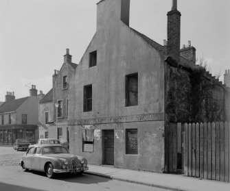 View of 41-53 High Street (odd numbers), Dysart, from NE. Includes a jaguar car.