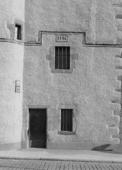 View of entrance and 1576 date stone, Tolbooth, Dysart, from W.