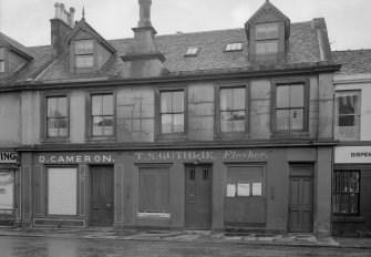 View of 4-8 Glasgow Street, Ardrossan, from NW, showing the premises of D Cameron and T S Guthrie, flesher.