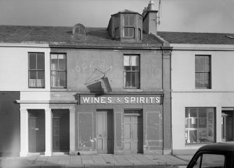 View of 11 Princes Street, Ardrossan, from SW, showing the Dock Bar.