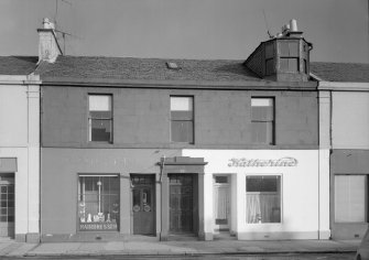 View of 19-23 Princes Street, Ardrossan, from SW, showing the premises of R Miller, hairdresser and Katherine.