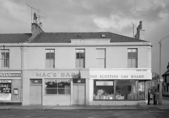 View of 33-39 Princes Street, Ardrossan, from SW, showing Mac's Bar and Scottish Gas Board.