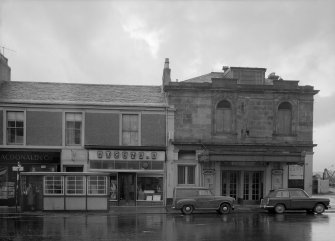 View of 55-59 Princes Street, Ardrossan, from SW, showing Eugene's and Lyric Bingo.