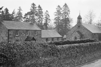General view of New Clunie Free Church School and schoolhouse, with New Clunie Free Church in the background.