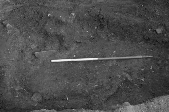 Excavation photograph : close up of base of pit f166, from W.