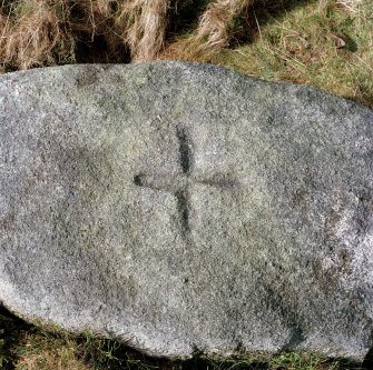 Detail of incised cross on the top of the stone