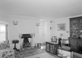 Interior view of Wedderlie House showing hall with fireplace.