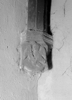 Interior view of Towie Barclay Castle showing corbel stop with one of the four evangelists in gallery of Great Hall.