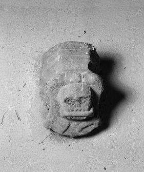 Interior view of Towie Barclay Castle showing corbel with skull and crossbones in gallery of Great Hall.