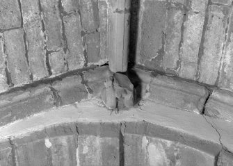 Interior view of Towie Barclay Castle showing decorated corbel in gallery of Great Hall.