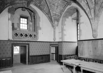 Interior view of Towie Barclay Castle showing Piper’s Gallery in Great Hall.