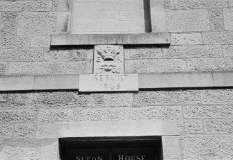 View of crest above front door inscribed 'E A 1706' and 'Rebuilt 1868', Seton House, Cross Wynd, Falkland.