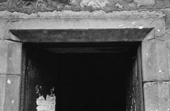 Detail of lintel from a house on E side of Back Wynd, Falkland.