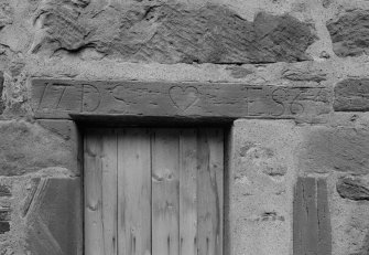 Detail of carved door lintel on E facade of the Salmon Fisher's House, Panha', Dysart.