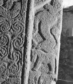 Detail of cross-slab at Ardchattan, showing animals on the right of the cross-shaft on face A.
 
