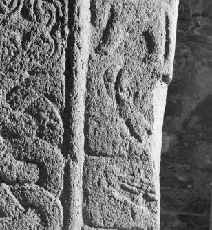 Detail of cross-slab at Ardchattan, showing musicians on the right of the cross-shaft on face A.
 
