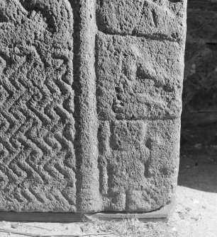 Detail of cross-slab at Ardchattan, showing musicians and warrior on the right of the cross-shaft on face A.
 
