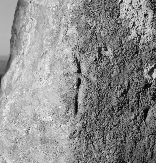 View of small incised cross on standing stone at Fowlis Wester.
 
