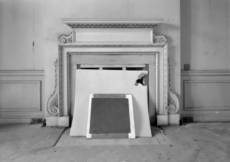 Interior view of Capelrig House showing fireplace in dining room on ground floor.