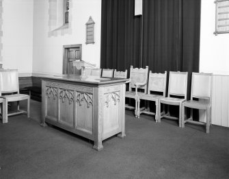 Interior.
Detail of 'elders' seats and preaching desk.