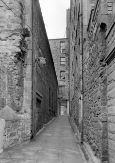 General view of South Gray's Close, Edinburgh, with 40 High Street on right and 42 High Street on left.