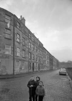 General view of 1-18 Parkside Street, 66-72 St Leonard's Street and 13 Henry Street, Edinburgh, from E.