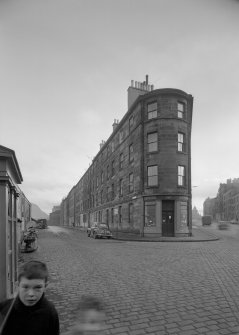 General view of the corner of 66-72 St Leonard's Street and 1-18 Parkside Street, Edinburgh, from NW.