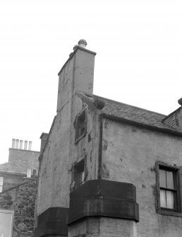 View of Hermits and Termits, 64 St Leonard's Street, Edinburgh, showing the chimney and windows of the S corner from S.